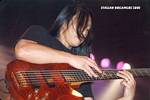 Джон Маюнг (John Myung) - Бас-гитара